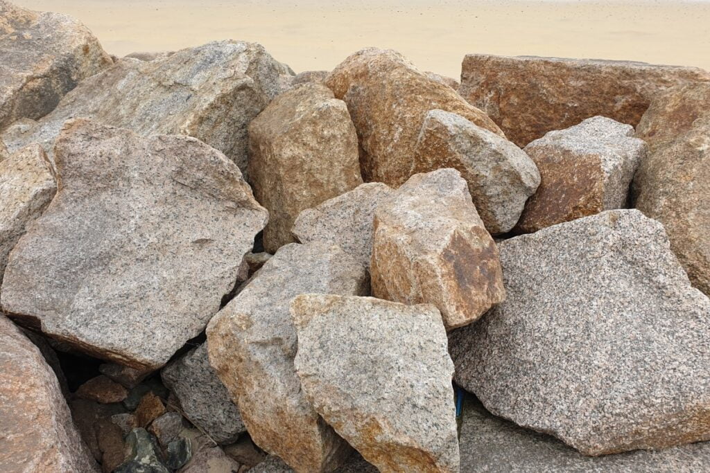 A pile of boulders on the beach, perfect for landscaping.